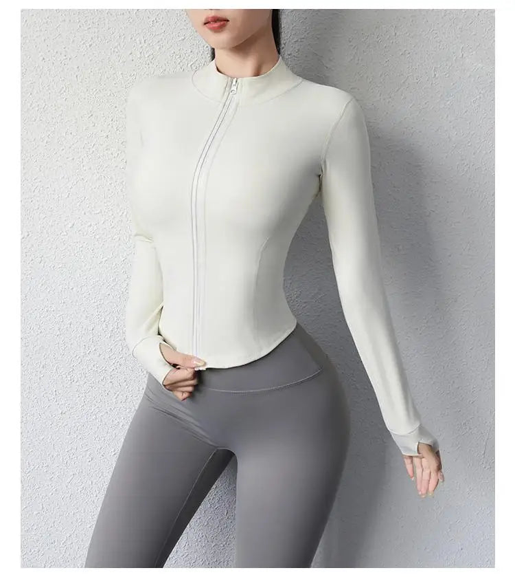 Kikis women's slim fit yoga jacket in white with zipper closure and long sleeves