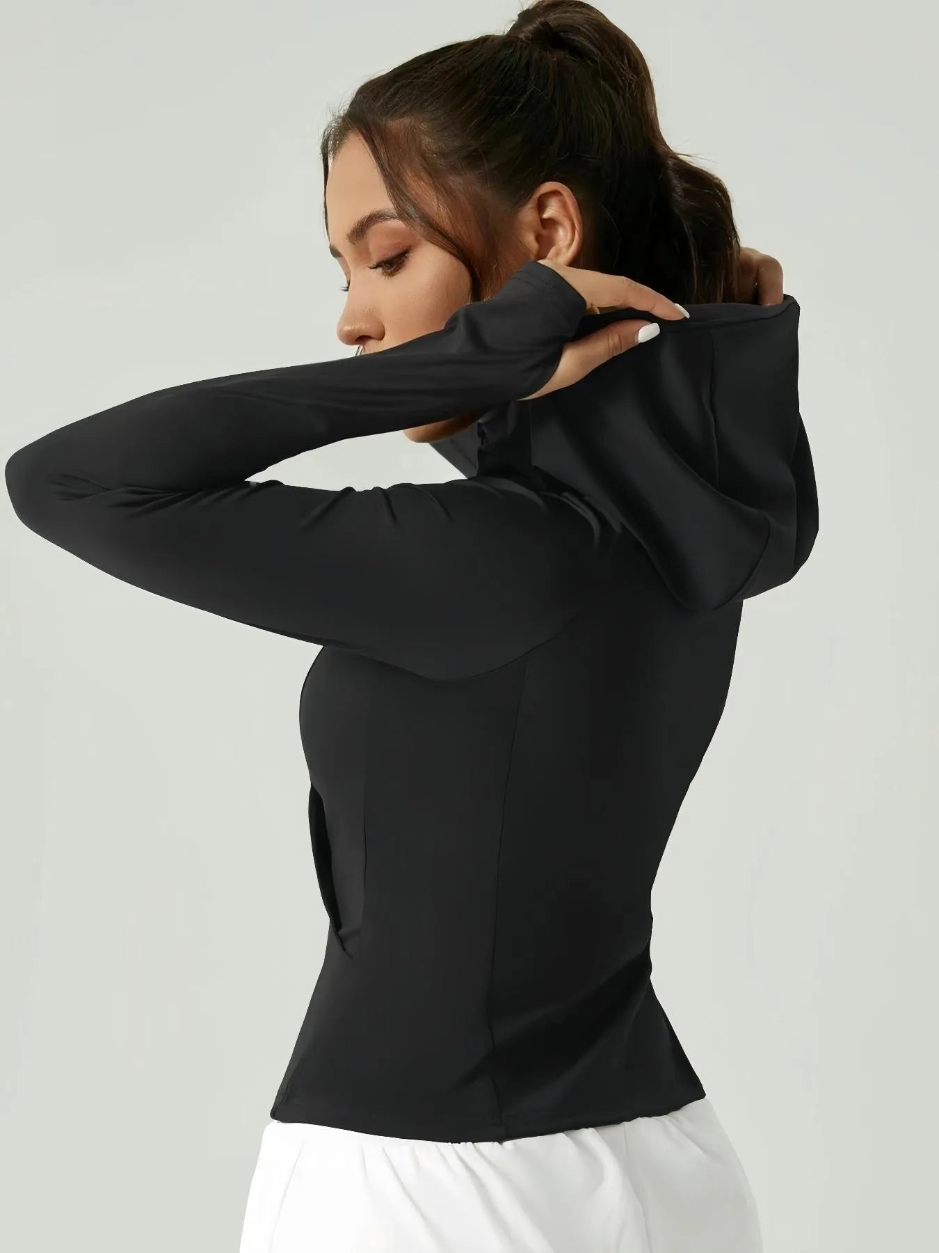 KiKis black women's thumb hole sports jacket with hood and fitted design