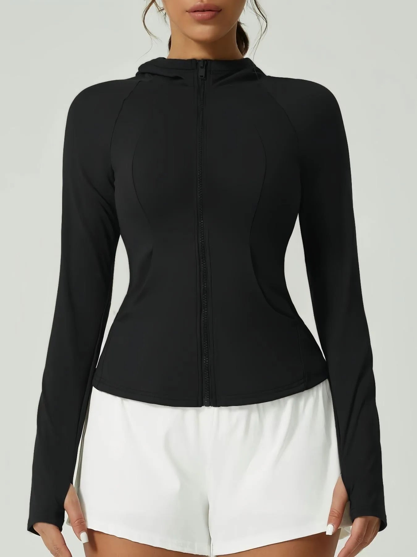 KiKis black women's thumb hole sports jacket with full front zipper and fitted design