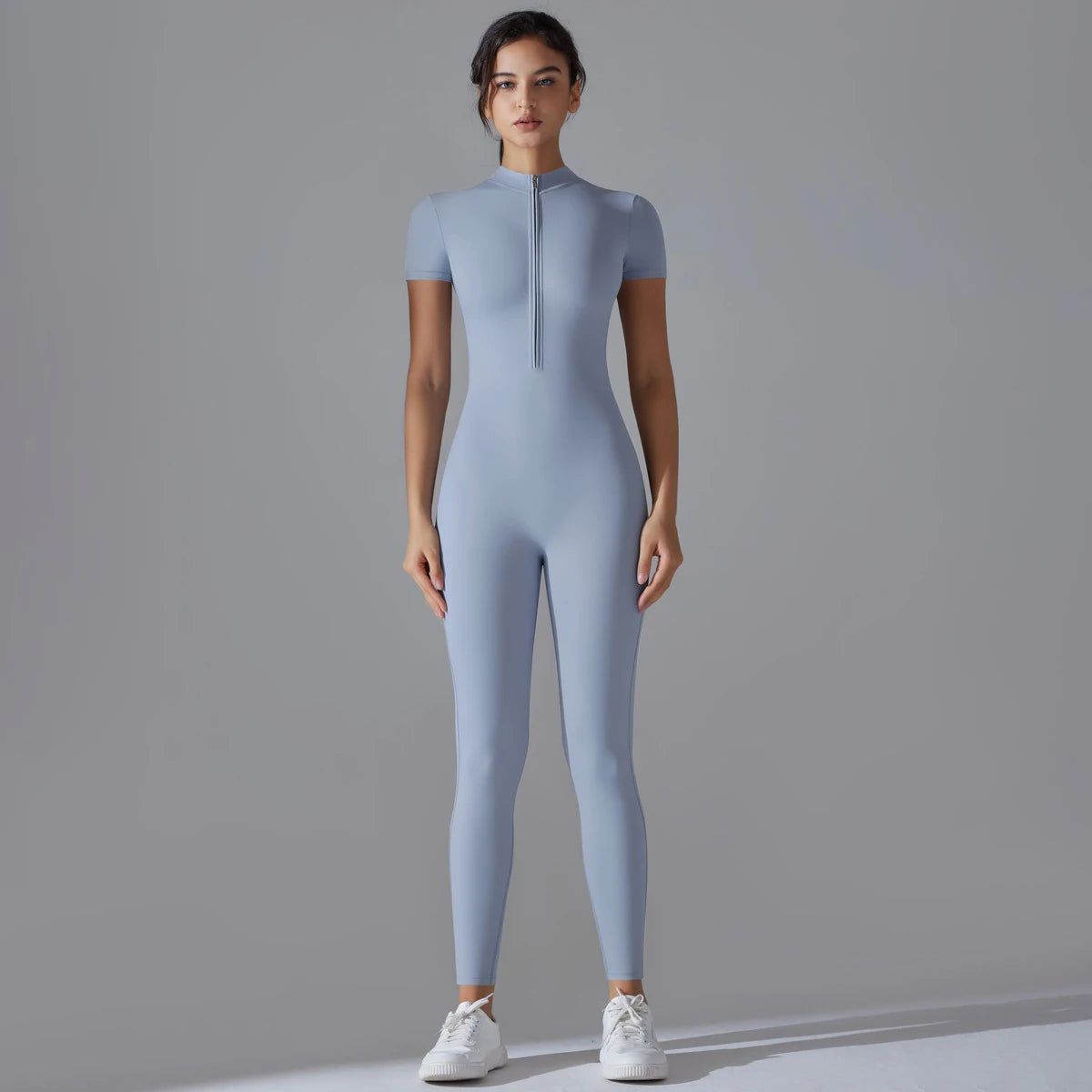 KiKis women's zipper yoga jumpsuit in light blue with short sleeves and front zipper