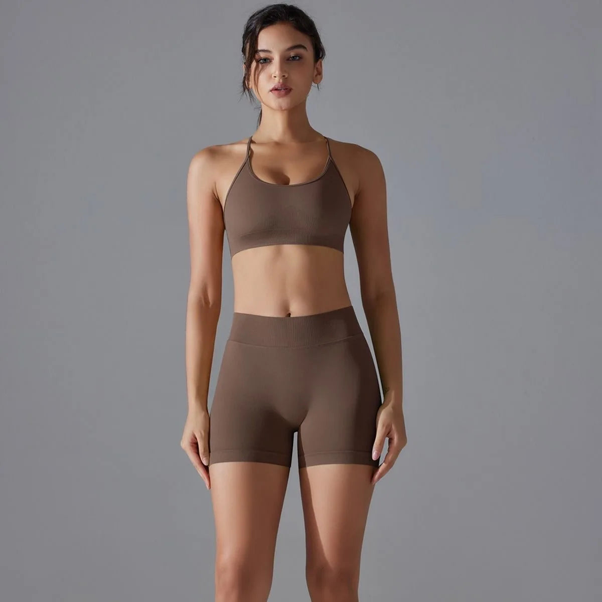 KiKis women's seamless gym set in brown with a sports bra and high-waisted shorts for workout comfort