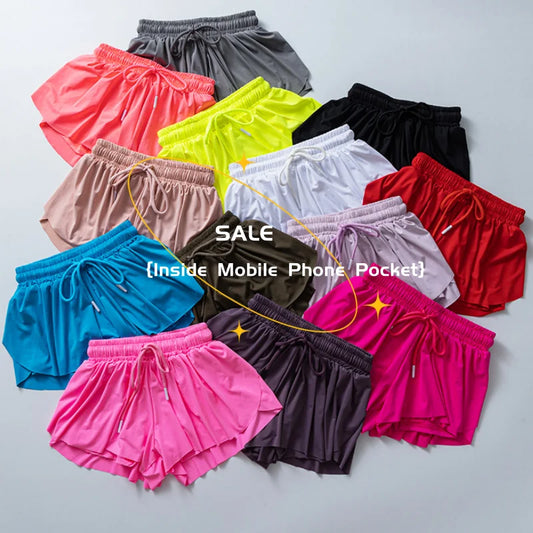 Colorful yoga running skirt shorts for women arranged in a circle showing various vibrant colors with elastic waistbands