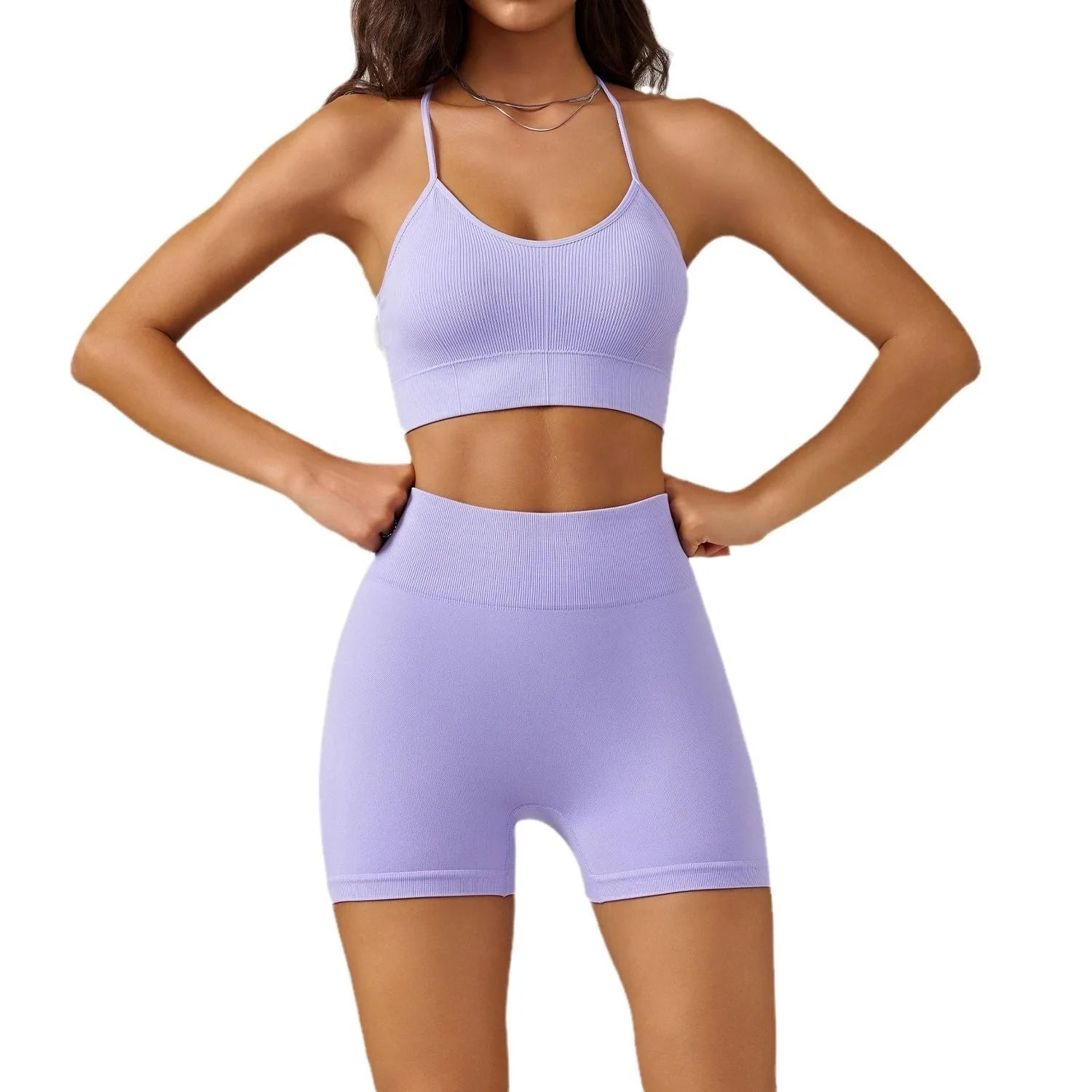 KiKis women's seamless gym set in light purple with a crop top and high-waisted shorts