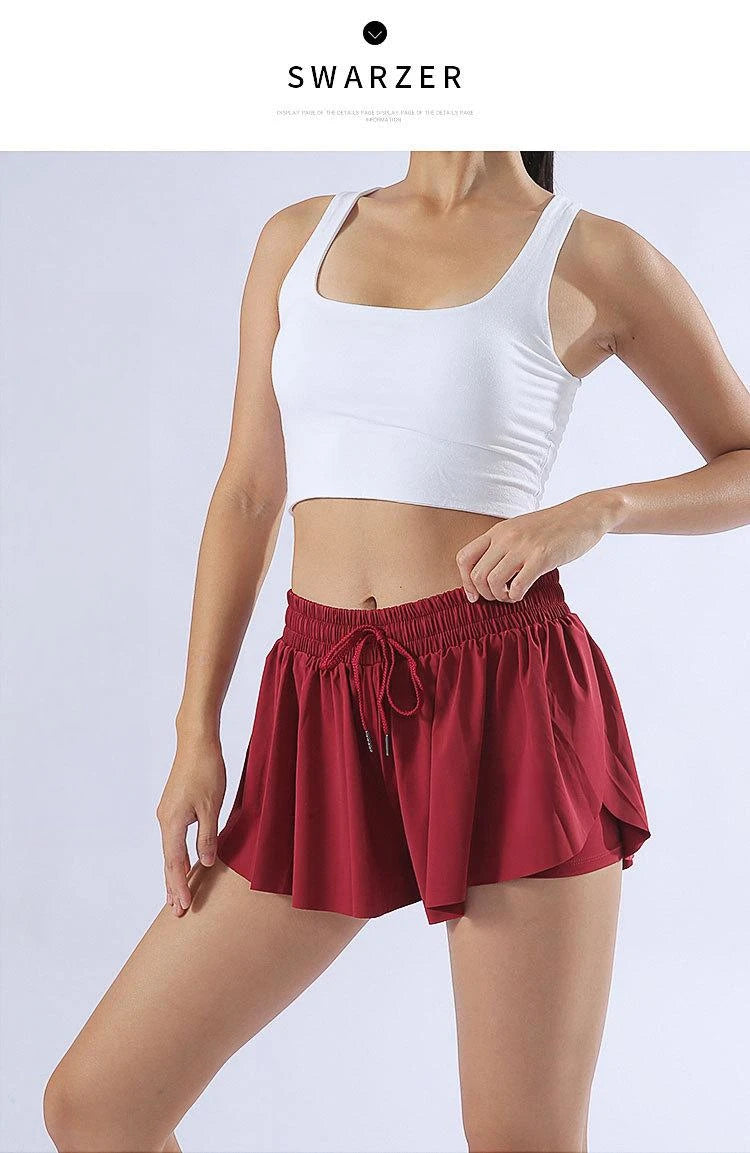 KiKis yoga running skirt shorts for women in red with drawstring waist and flowy design