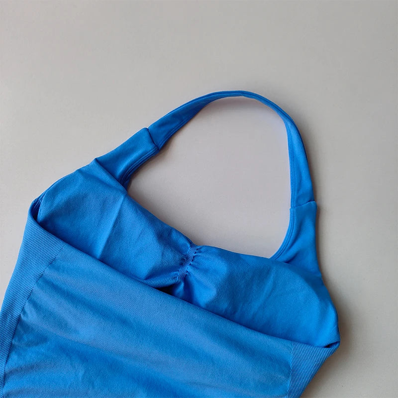 Blue halter neck sports bra for women with seamless design and supportive fit by KiKis