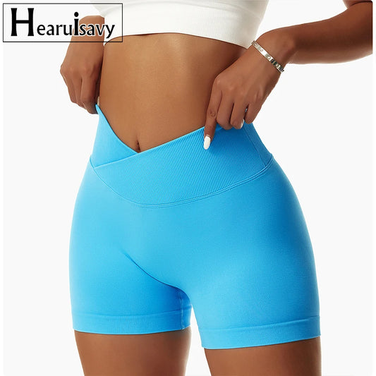 KiKis bright blue high waist seamless yoga shorts worn by woman with white crop top