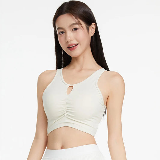 KiKis women's push up sports bra in white with keyhole front and ruched detailing