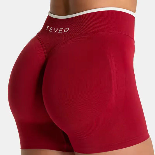 Red women's seamless high waist gym shorts with contour design for enhanced fit and comfort