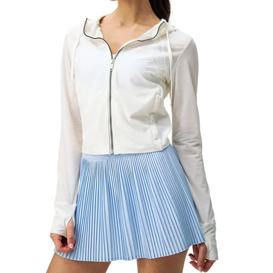 KiKis breathable yoga clothes for women including a white zip-up hoodie and light blue pleated skirt