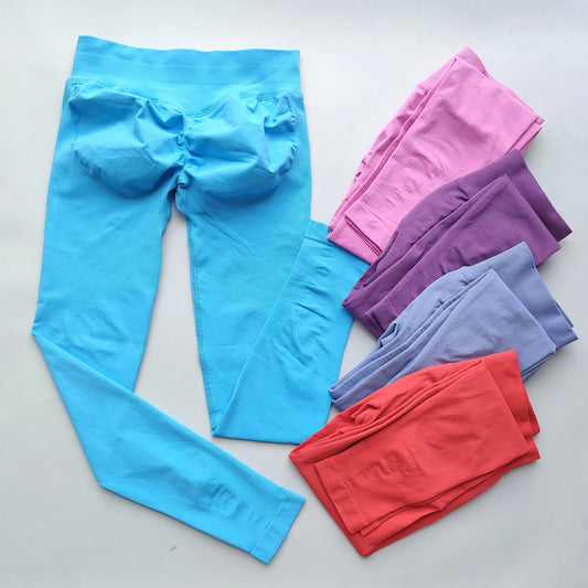KiKis Woman Scrunch Bum Flare Leggings in multiple colors including blue, pink, purple, and orange