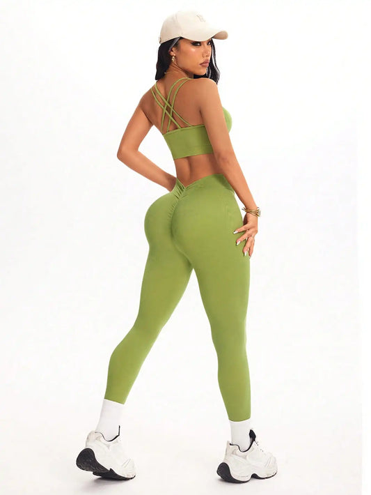 KiKis women's 2 piece yoga set in green with crisscross strap sports bra and high-waisted leggings