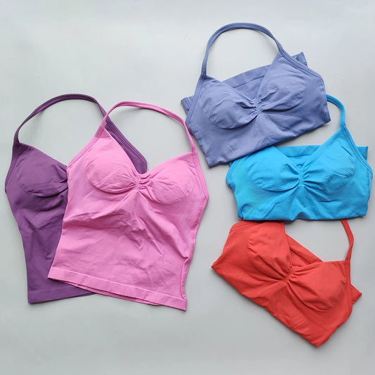KiKis women's backless gym top collection in purple pink blue and orange colors with adjustable straps