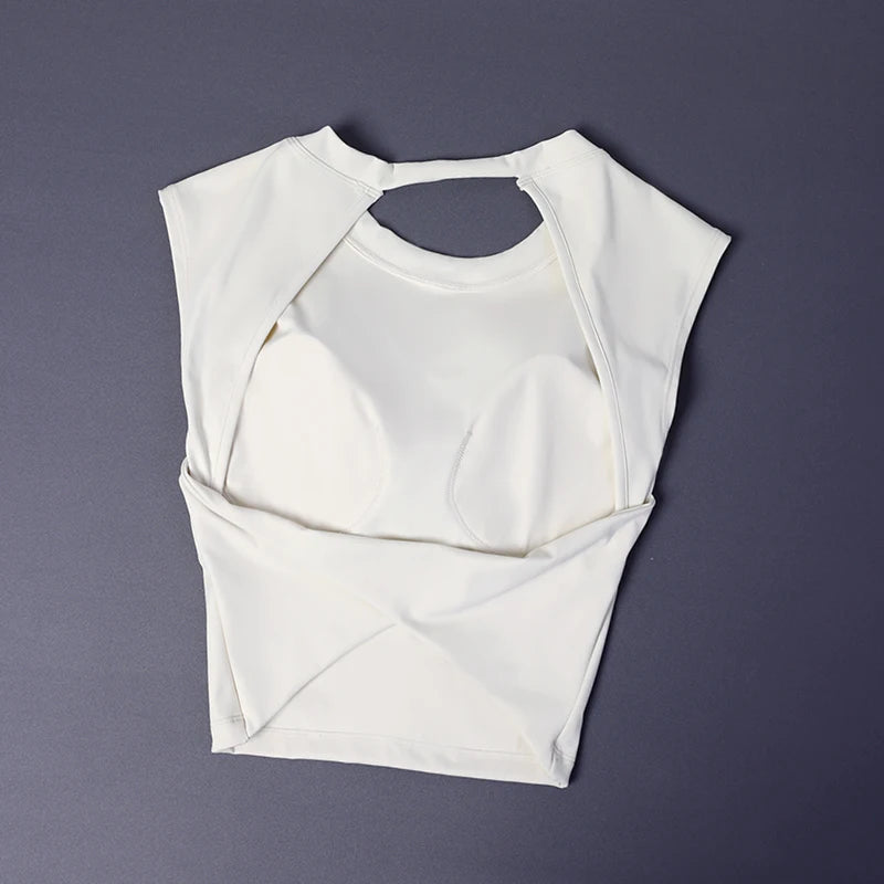 KiKis women's backless sports tank top in white laid flat showing front and back cutout design