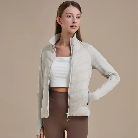 KiKis women's short down jacket in light beige with quilted front and stretch knit sleeves